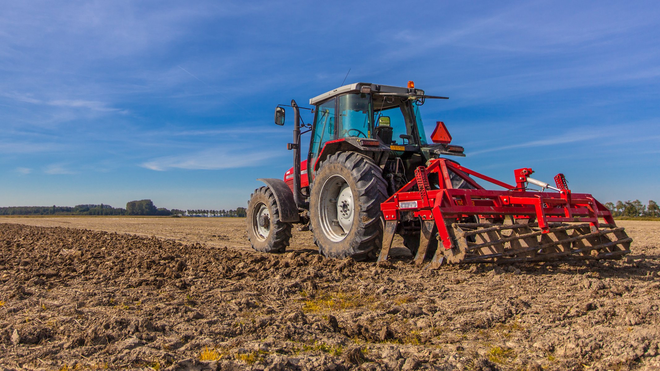 Tractor ploughing field